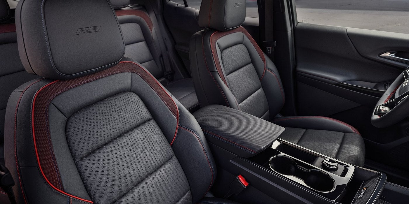 Front leather seats and center console inside a Chevrolet Equinox